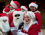 Santa sings carols with passion